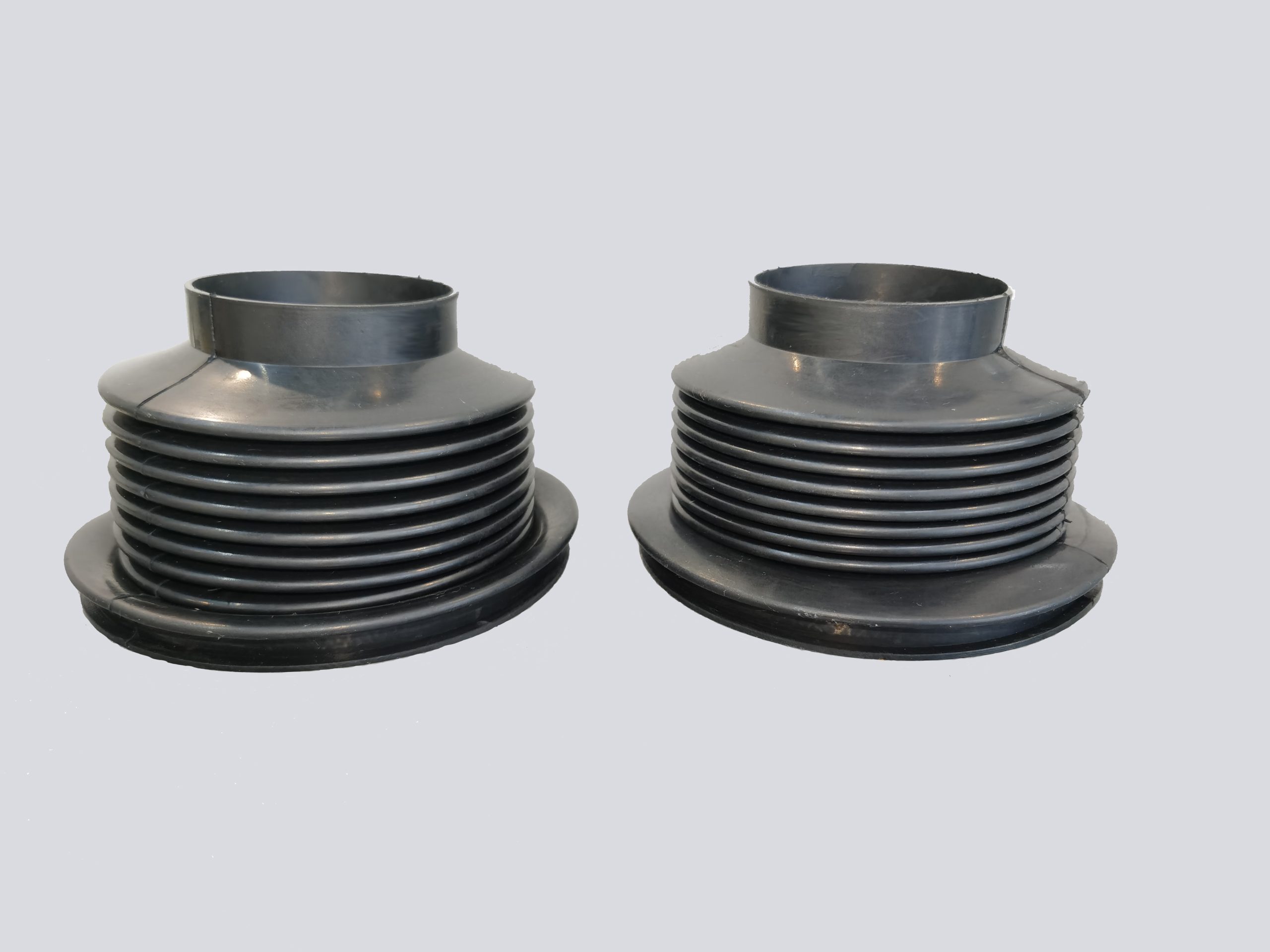 Hintan-Tech rubber waterproof pad installed on a glass straight edging machine